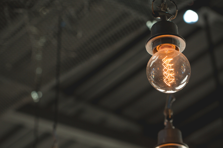 Close up of Illuminated light bulb with copy spaceの写真素材