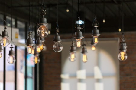 Close up of Illuminated light bulb with copy space