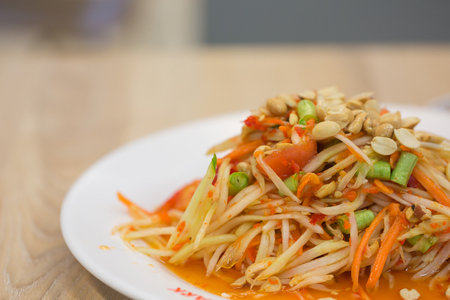 Close up of green papaya salad. spicy thai food.の写真素材