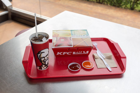 UdonThani ,THAILAND - FEBRUARY 6, 2016: Kentucky Fried Chicken (KFC) Restaurant Menu, KFC is a fast food restaurant chain that specializes in fried chickenのeditorial素材