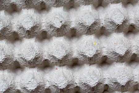 Close up detailed of paper eggs container box texture background.の写真素材