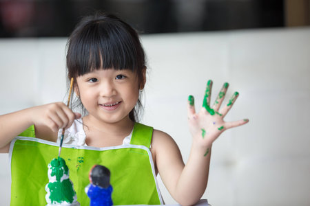 Asian girl painted on plaster doll.の写真素材