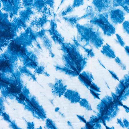 The fabric indigo tie dye as a background and texture