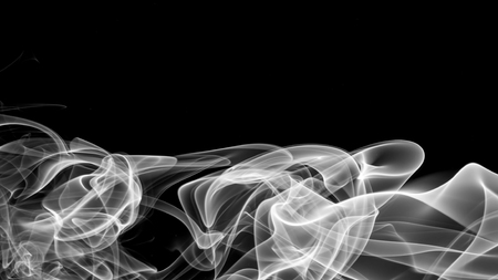 Movement of smoke,Abstract white smoke on black background.の写真素材