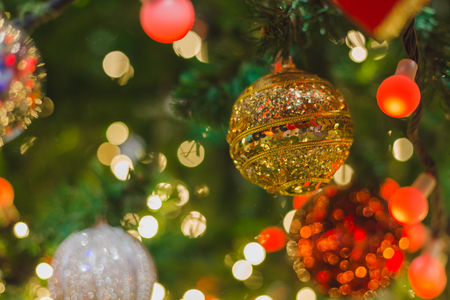 Colorful Red, Yellow and Green Christmas Tree Bokeh background of de focused glittering lightsの写真素材