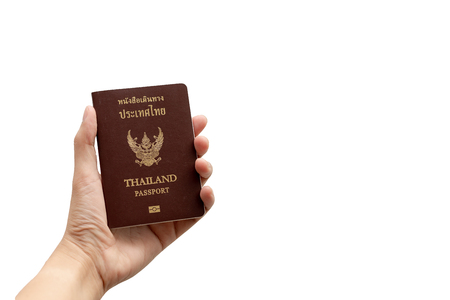 Hand holding Thailand passpor.の写真素材