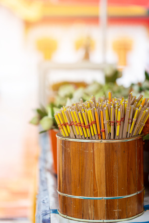 incense stick and candle for Buddhist ceremonyの写真素材