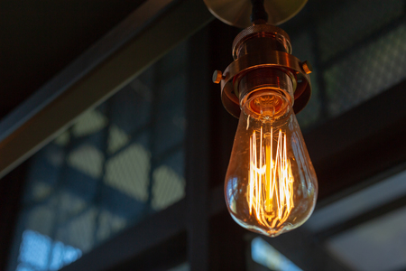 Close up of Illuminated light bulb with copy spaceの写真素材