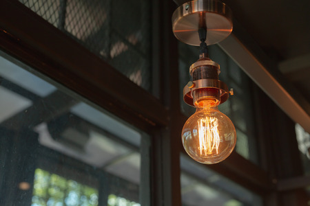 Close up of Illuminated light bulb with copy spaceの写真素材