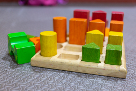 Wooden building blocks on table.の写真素材