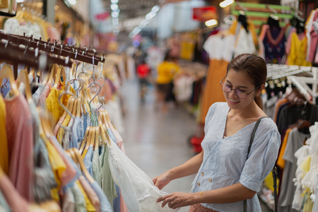 Asian women choose to buy clothes in the wholesale market of clothing in department storesのeditorial素材