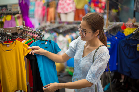 Asian women choose to buy clothes in the wholesale market of clothing in department storesのeditorial素材