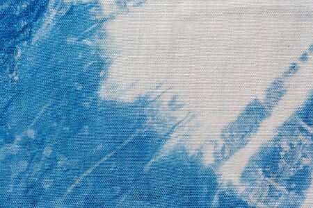 The fabric indigo tie dye as a background and texture