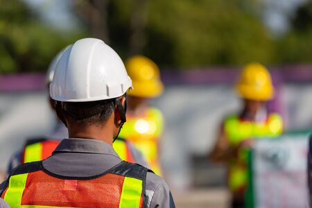 electrician is wearing a white helmet before working..の写真素材