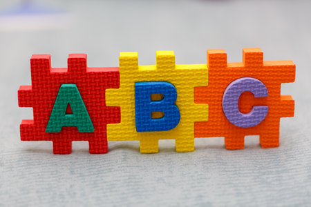 Alphabet puzzle pieces,Toys for enhancing development.の写真素材