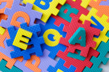Alphabet puzzle pieces,Toys for enhancing development.の写真素材