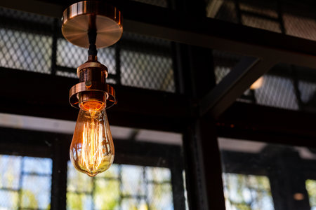 Close up of Illuminated light bulb with copy spaceの写真素材