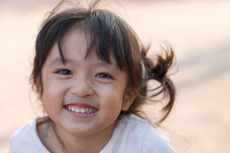Portrait of beautiful kid girl,Girl smiling with fun.