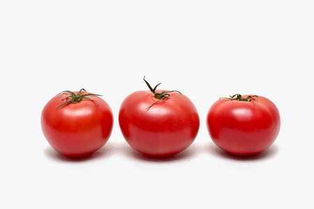 Tomato displayed on the tableの写真素材