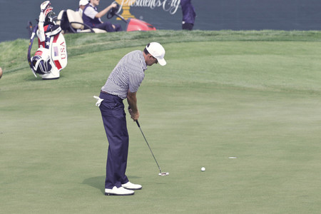 United States Team Player Jimmy Walker putting shot near 18th hole during the President Cup 2015 practice day two at Jack Nicklaus GC in Songdo, Incheon.のeditorial素材