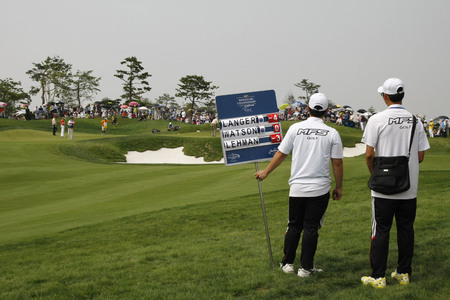 Volunteers hold 4th players group score board of 8th hall during the PGA Tour Songdo IBD championship second round at Jack Nicklaus golf club in Incheon, west of Seoul, on Sep 17, 2011, South Korea.のeditorial素材