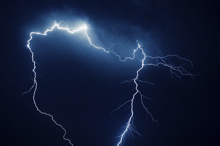 Thunder bolt over small village