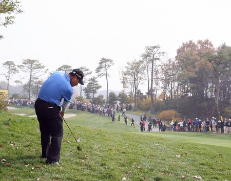 October 23, 2011 - Yeoju, South Korea : KJ Choi of South Korea, play approach shot on the fairway during an 2011 CJ Invitational Golf  final round at Haesley Nine Bridge Golf Club.のeditorial素材