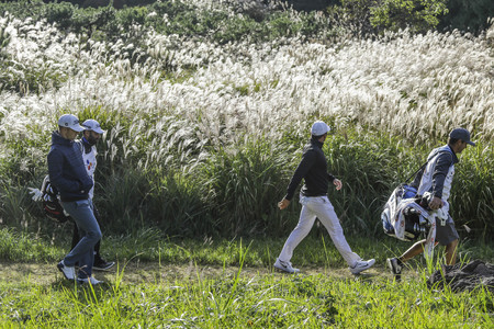(From left) Morgan Hoffmann and Jason Day moving after tee up on the 1th green during an PGA TOUR CJ CUP NINE BRIDGE DAY 4 at Nine Bridge CC in Jeju Island, South Korea.のeditorial素材