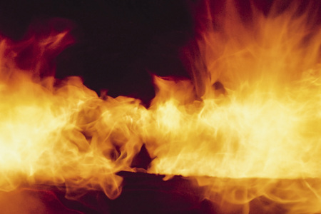 Close up of fire and flames on a black background Huge file