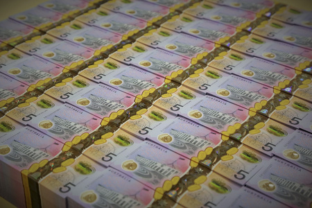 Shows stacks of next generation five Australian dollar banknotes. The Reserve Bank of Australia...