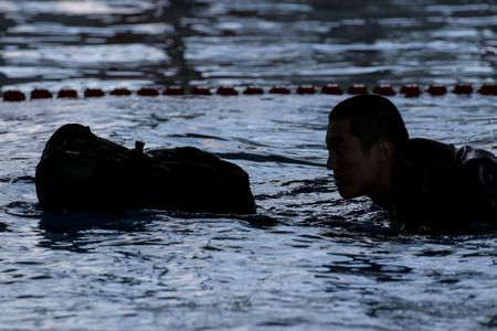 April 12, 2019-Pohang, South Korea-South Korean Marine Trainees take part in an 7week course basic training camp at the South Korean Marine Training Center in Pohang, South Korea. On comming April 19 is the South Korean Marine Corps 70th Anniversary day.のeditorial素材