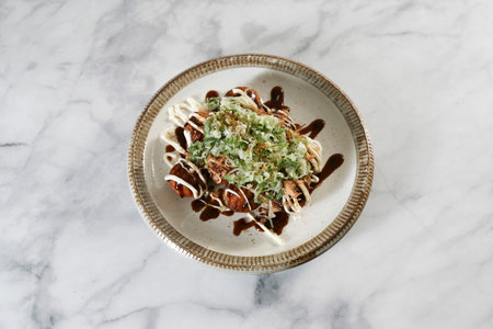 Japanese Octopus ball decorated on the bright table.の写真素材
