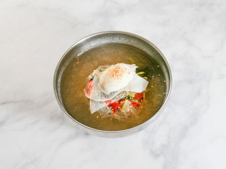 July 8, 2025-Sangju, South Korea-A Various styles Naengmyeon(Buckwheat cool noodles) decorated on...