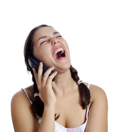 Beautiful girl is happy using the phoneの写真素材