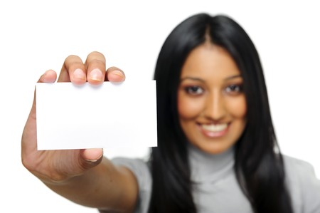 Indian girl shows her business card to camera.の写真素材