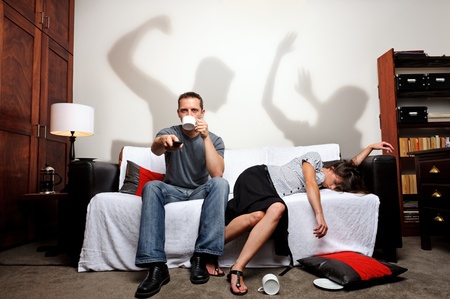 Shadows showing what just happened between the couple, a domestic abuse concept Shadows showing what just happened between the couple, a domestic abuse concept