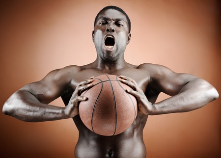 Buff basketball player is aggressiveの写真素材