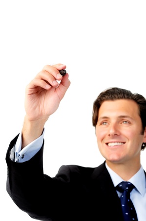 Smiling businessman writes with a marker, copyspace for own text and diagramの写真素材