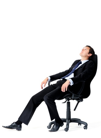 Businessman is distracted while on the job の写真素材