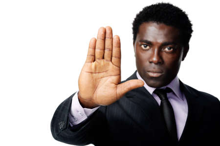 Businessman stopping with a hand gestureの写真素材