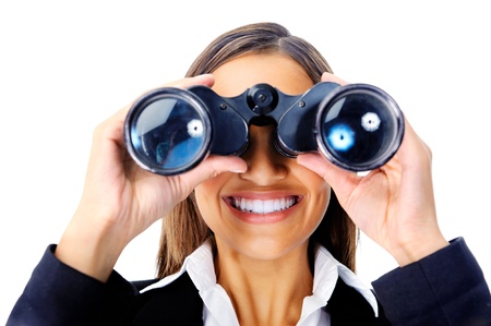 Portrait of a businesswoman searching for new job opportunities with binoculars. can also be used as business vision concept Portrait of a businesswoman searching for new job opportunities with binoculars. can also be used as business vision concept