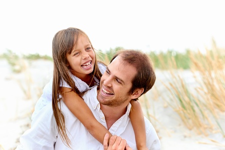 adorable father and daughter have fun together happy healthy lifestyle smiles adorable father and daughter have fun together happy healthy lifestyle smiles