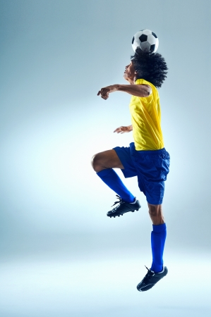 Soccer fotball player header ball with skillの写真素材