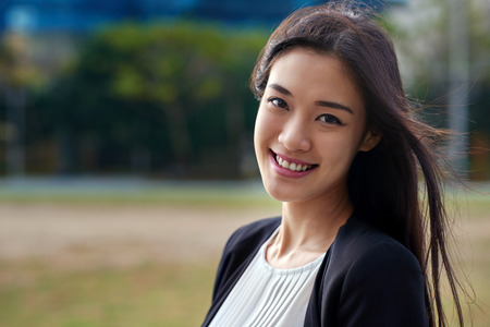 professional asian chinese business woman portrait outdoorsの写真素材