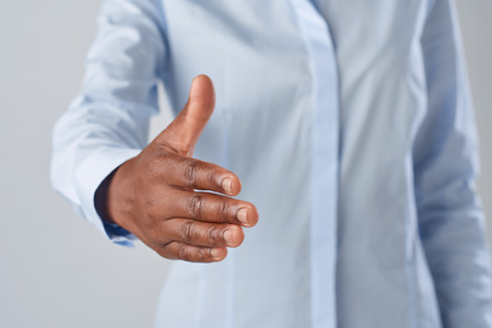 business woman handshake for trust deal is black african and corporateの写真素材
