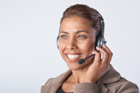 Portrait of asian woman with headphones Consulting and assistance service hotlineの写真素材