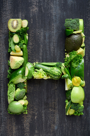 Fruit and vegetable alphabet letters concept for design layout and word spelling complete setの写真素材