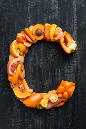 Fruit and vegetable alphabet letters concept for design layout and word spelling complete setの写真素材