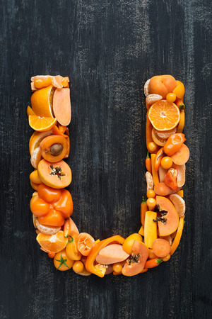 Fruit and vegetable alphabet letters concept for design layout and word spelling complete setの写真素材