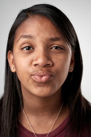 Full collection of real funny faces people making silly expressionsの写真素材